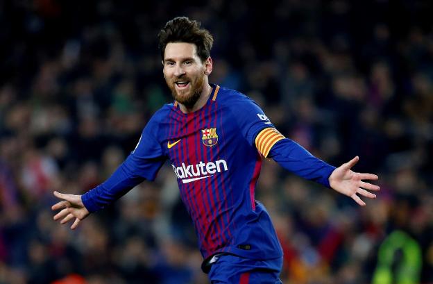 Leo Messi celebra uno de los dos goles que anotó ayer ante el Girona. :: efe