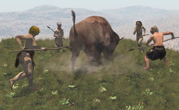 Recreación de la caza de un bisonte por un grupo de neandertales. 