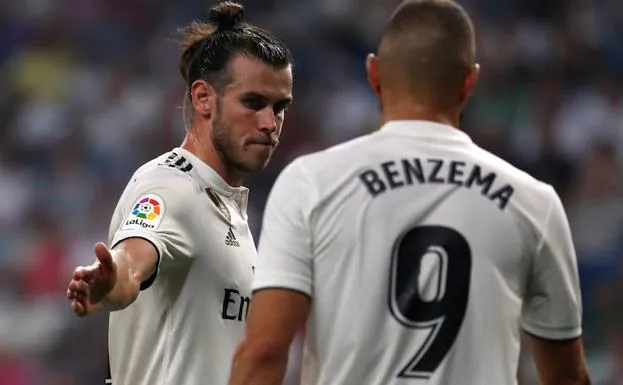 Bale y Benzema celebran un gol ante el Leganés. 