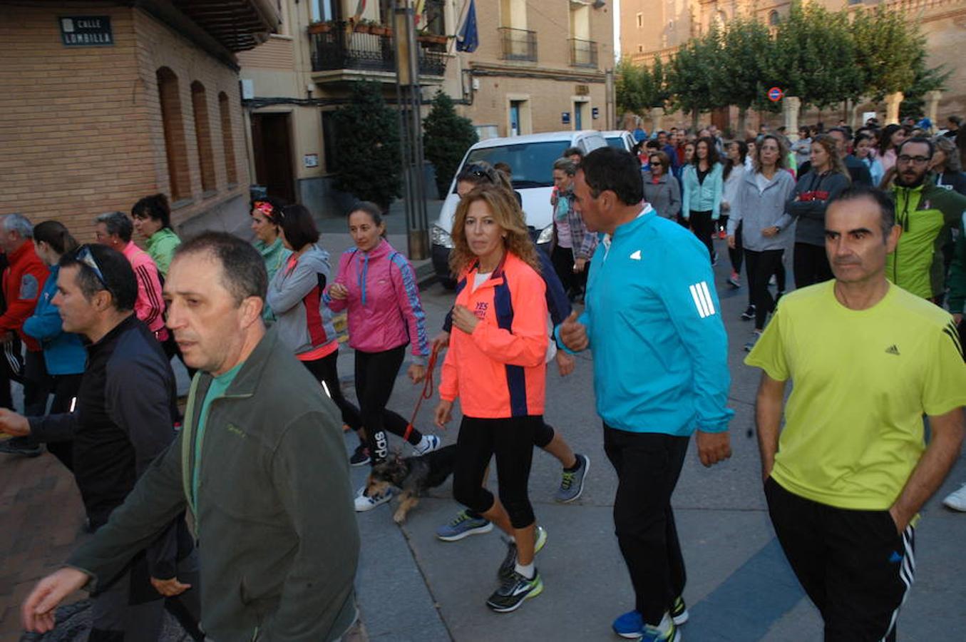 Imágenes correspondientes a la marcha para recaudar fondos contra el cáncer en Aldeanueva de Ebro.