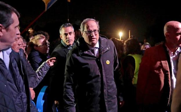 El presidente de la Generalitat, Quim Torra (c), a su llegada al acto. 