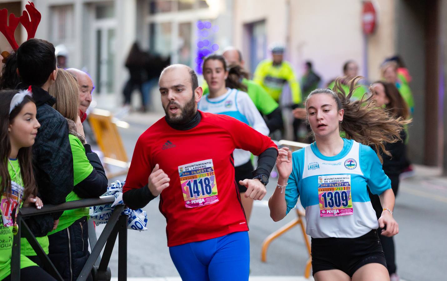 Los dos atletas que habían vencido por la mañana en Navarrete repiten triunfo en una prueba con más de 1.800 atletas