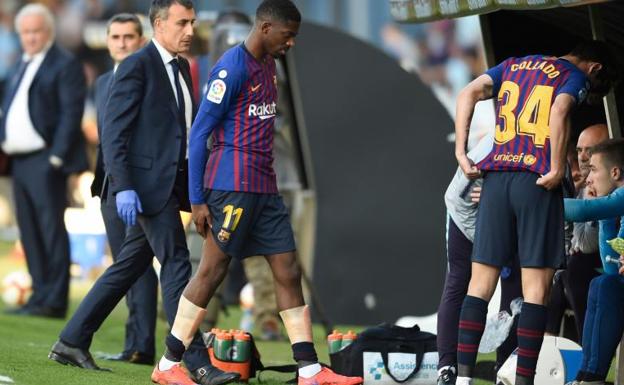 Ousmane Dembélé, se retira lesionado del terreno del juego en el partido contra el Celta.