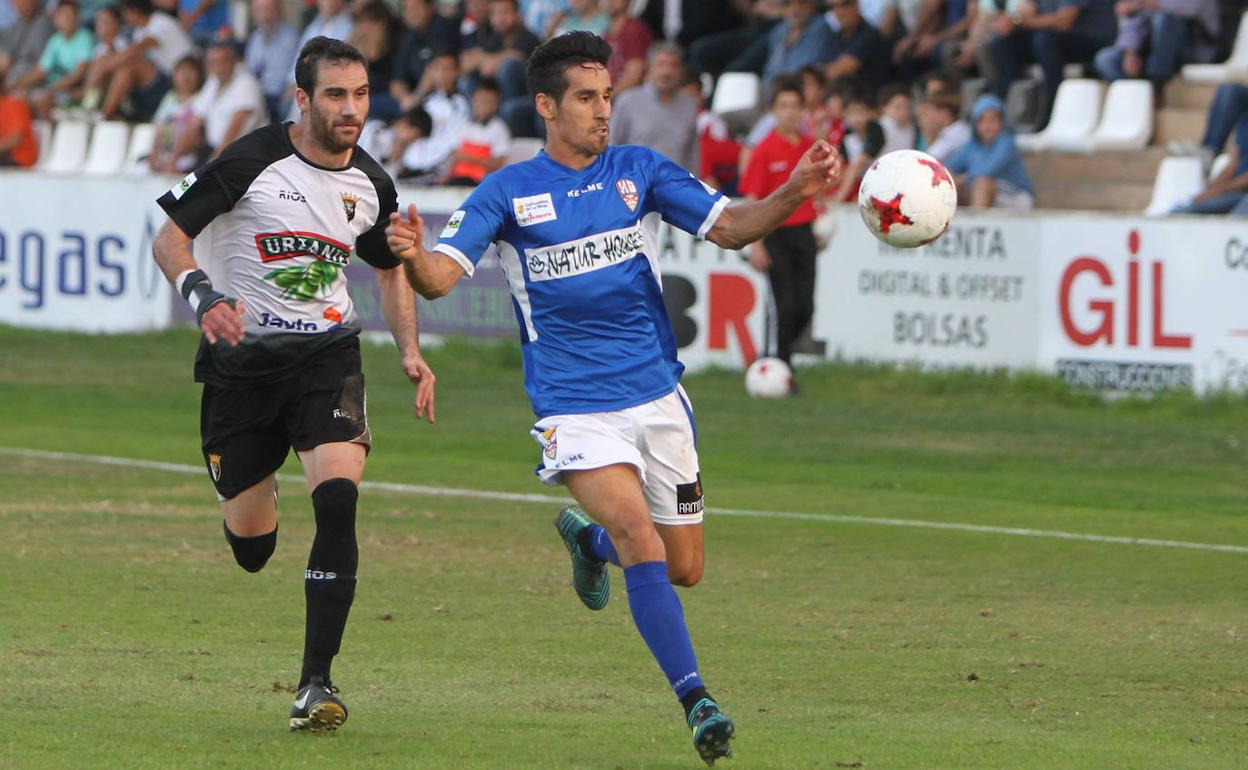 Iñaki Jiménez (izquierda) y Rayco en un partido entre el Tudelano y la UDL.