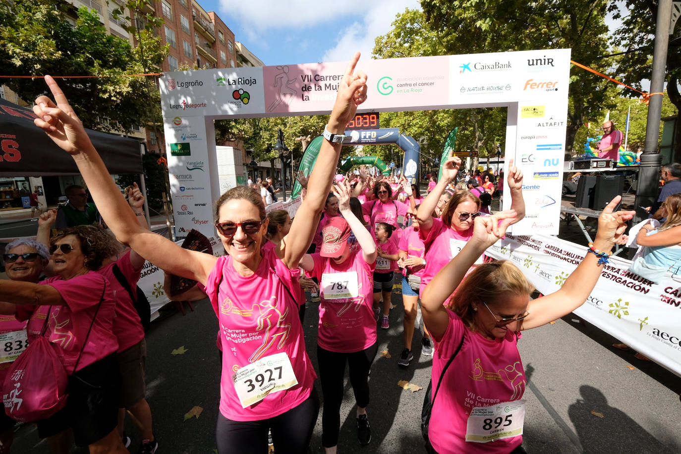 Fotos: Carrera de la Mujer en Logroño: preparación, ánimos y en la línea de salida