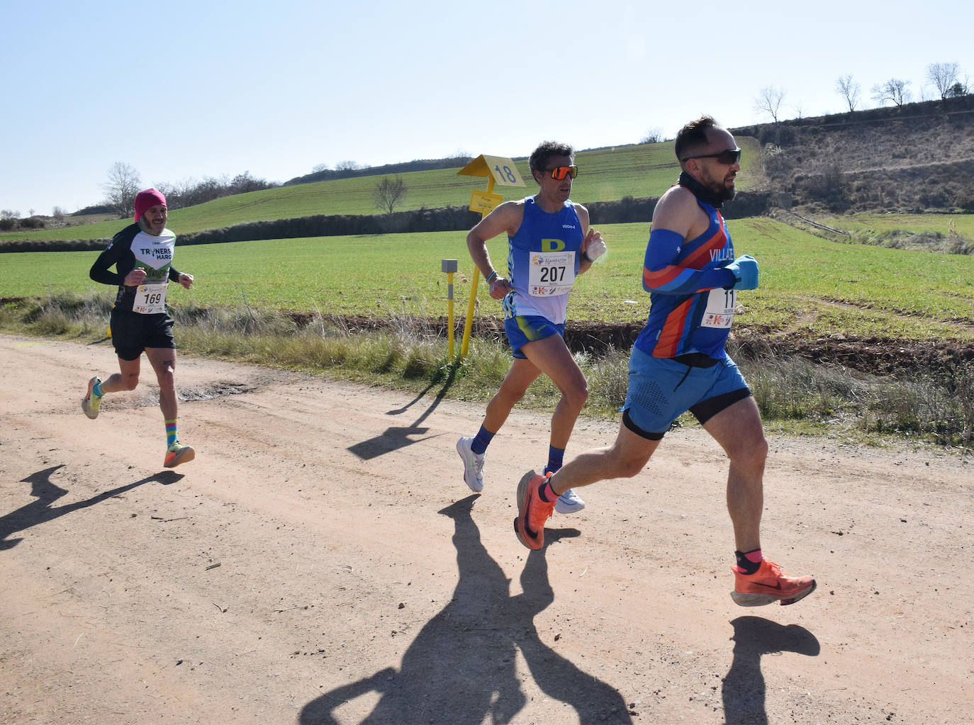 Fotos: El najerino David Martínez se impone en la Media Maratón del Camino