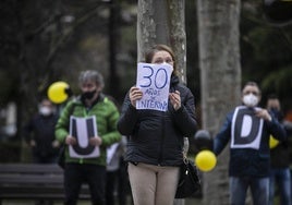 Imagen de una interina durante una protesta de 2021.