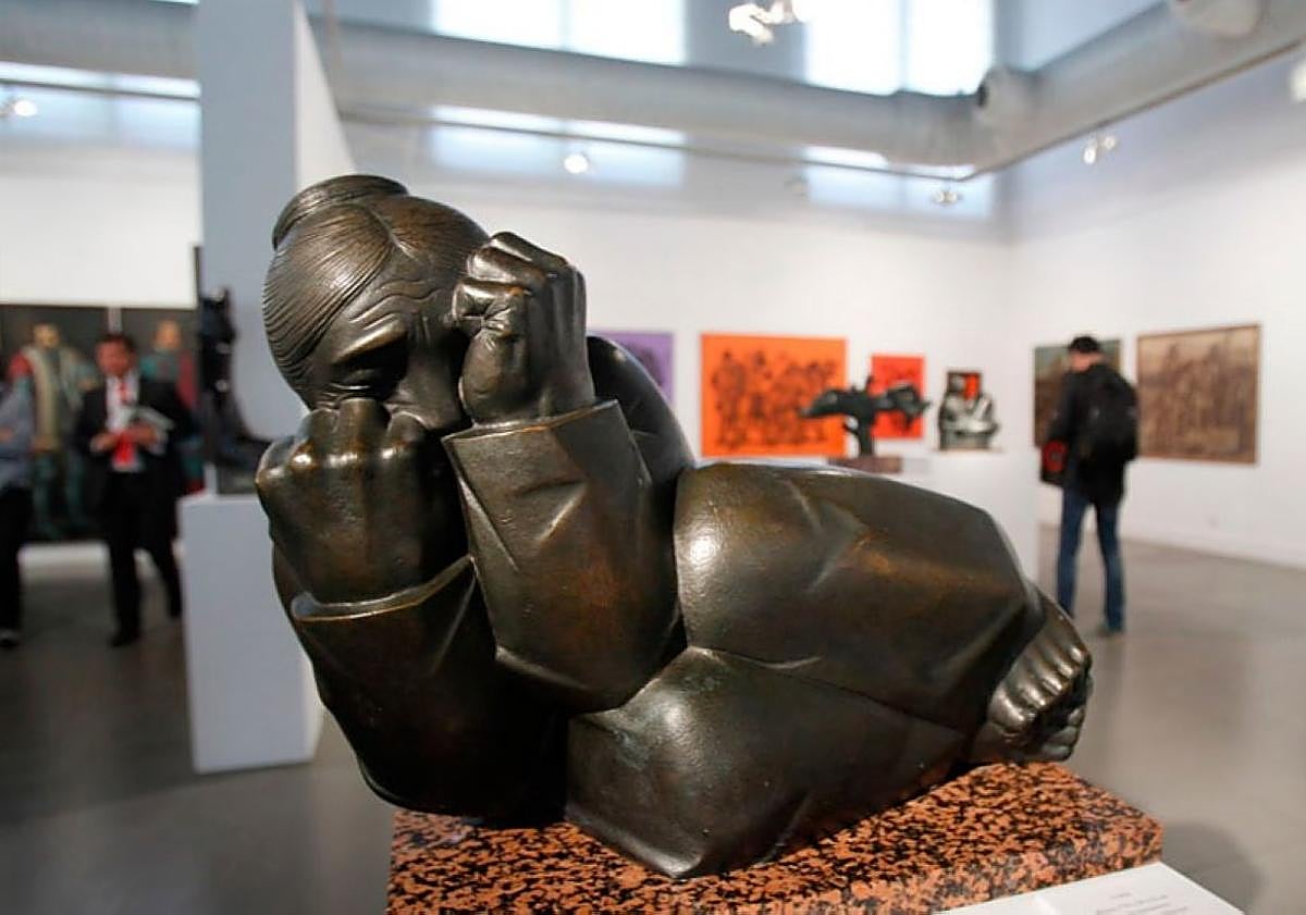 Imagen principal - Dos hombres, decenas de manos