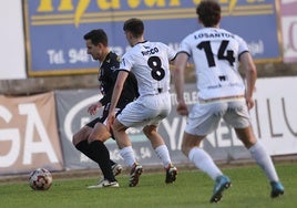 Riccobene y Losantos, durante un partido en La Molineta.