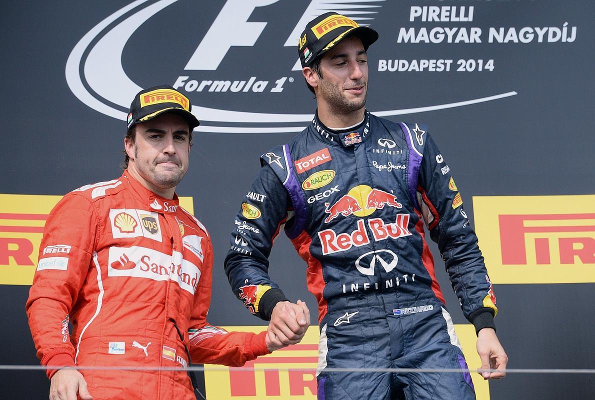 Alonso (i) y Ricciardo, en el podio de Hungría. 