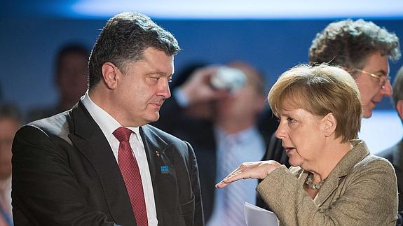 Poroshenko y Merkel. 