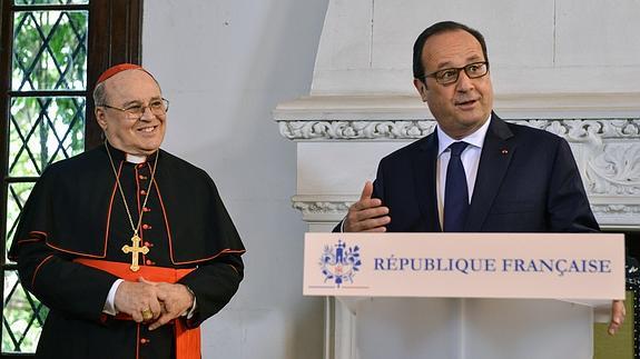 François Hollande, junto al cardenal Jaime Ortega. 