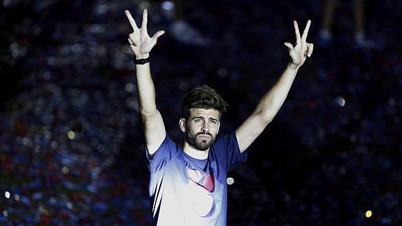 Gerard Piqué, durante la celebración del 'triplete'. 