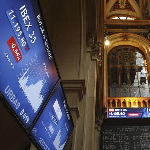 Paneles en la Bolsa de Madrid.