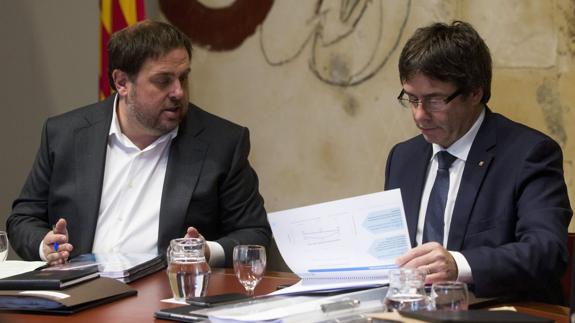 Oriol junqueras y Carles Puigdemont.