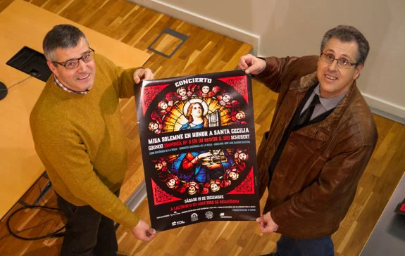 Raúl Gonzalo y José Luis Barrio, con el cartel del concierto. :: díaz uriel