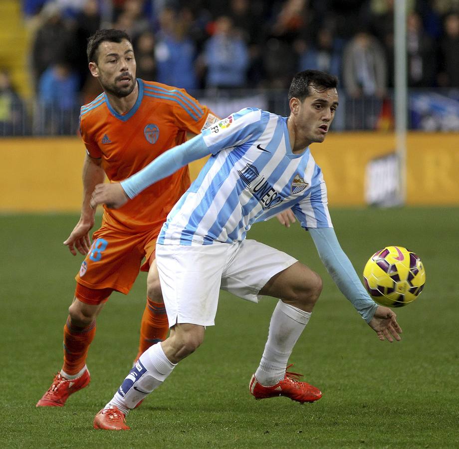 El Málaga - Valencia en imágenes