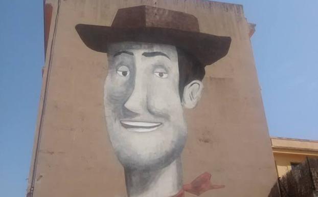 Imagen de Woody, protagonista de Toy Story, en el mural pintado por Escif. 