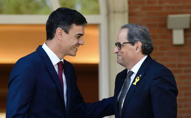 El presidente del Gobierno, Pedro Sánchez, junto al presidente de la Generalitat, Quim Torra.