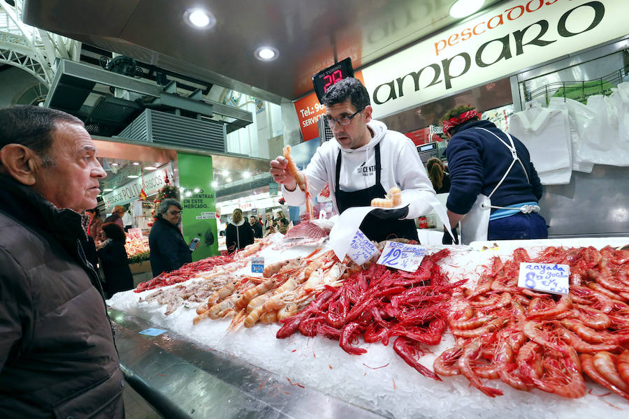 Fotos: La Navidad rescata los mercados de Valencia