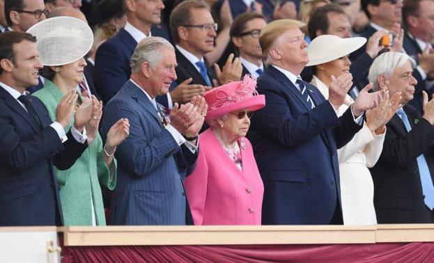 Emmanuel Macron, el príncipe Carlos de Inglaterra, la reina Isabel II, Donald Trump y su mujer, Melania.