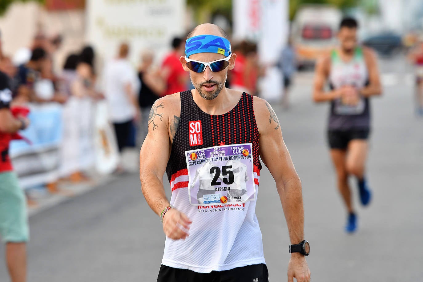 Fotos: Búscate en la 10K XXIV Carrera Tomatina de Buñol 2019