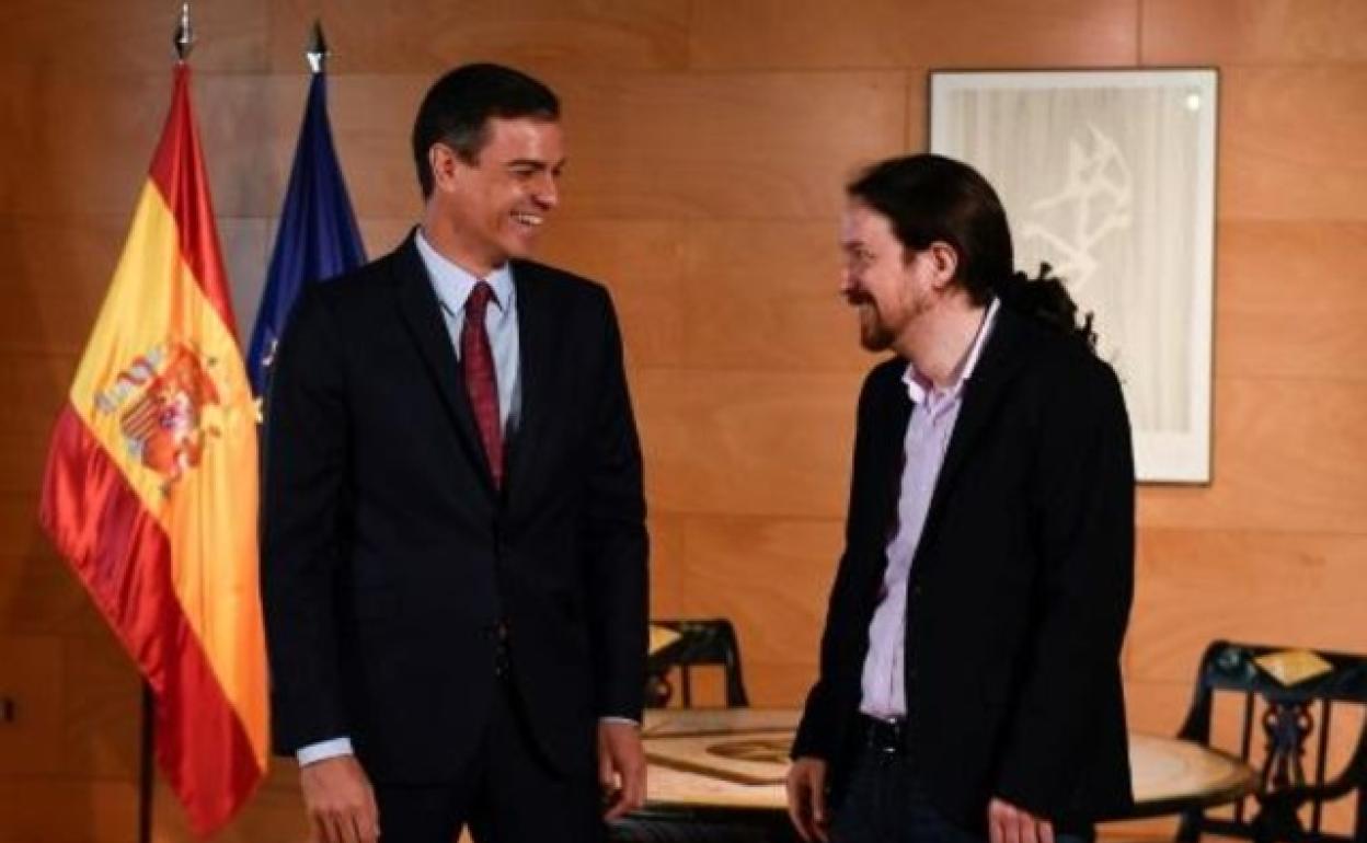 Pedro Sánchez y Pablo Iglesias, sonrientes, en una imagen de archivo.