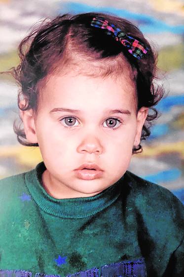 De bebé. De pequeña ya destacaba por sus grandes ojos azules.