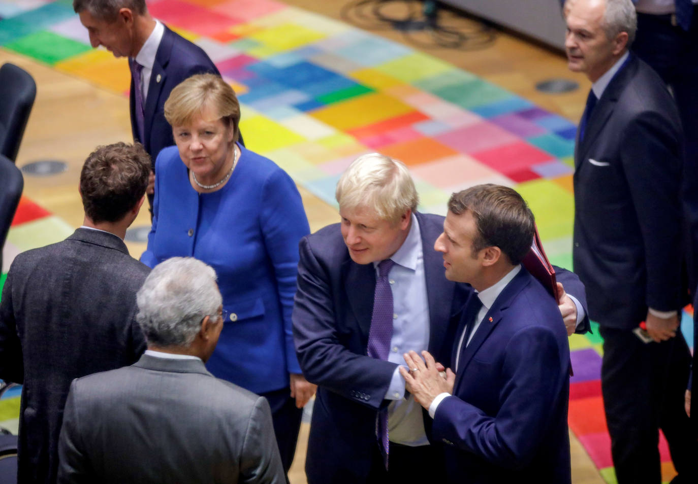 Angela Merkel, Emmanuel Macron y Boris Johnson. 