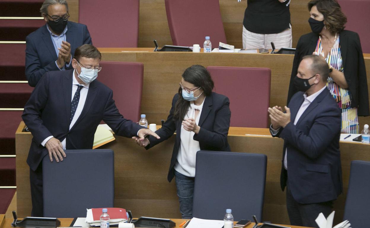 El presidente de la Generalitat, Ximo Puig, junto a Oltra y Martínez Dalmau, los vicepresidentes