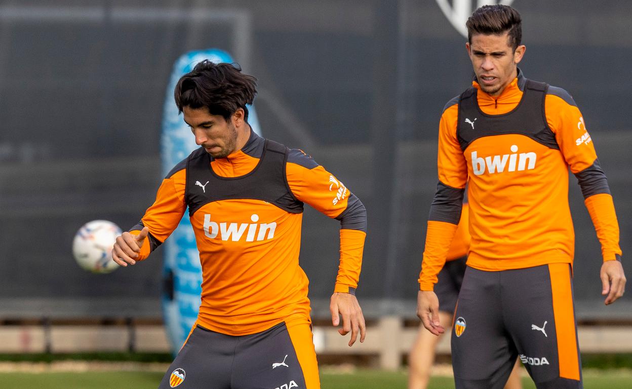 Carlos Soler y Gabriel Paulista. 