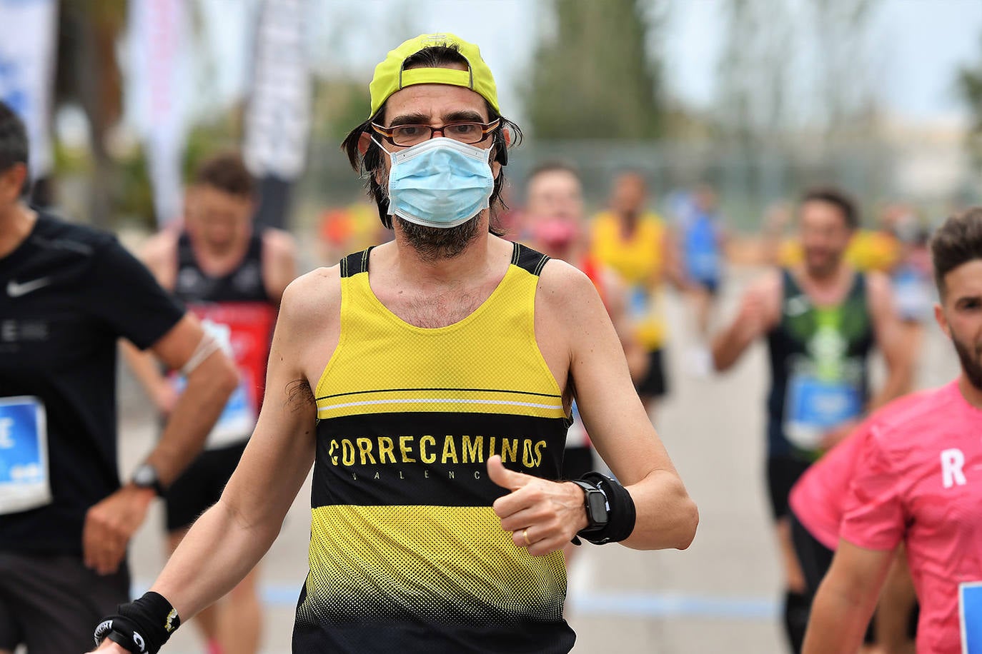 Bajo el lema 'Valencia vuelve a correr', los participantes de la 5K han salido a recorrer la ciudad de Valencia al ritmo de sus zancadas. La ciudad ha acogido la segunda carrera popular tras más de un año de parón por el coronavirus y los corredores se han lanzado a las calles con ganas e ilusión.