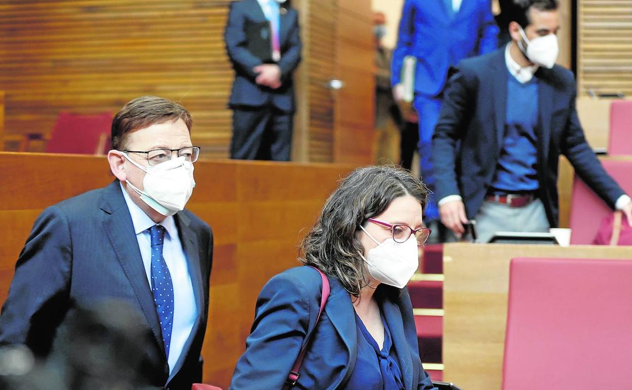 El presidente de la Generalitat, Ximo Puig, junto a la vicepresidenta, Mónica Oltra