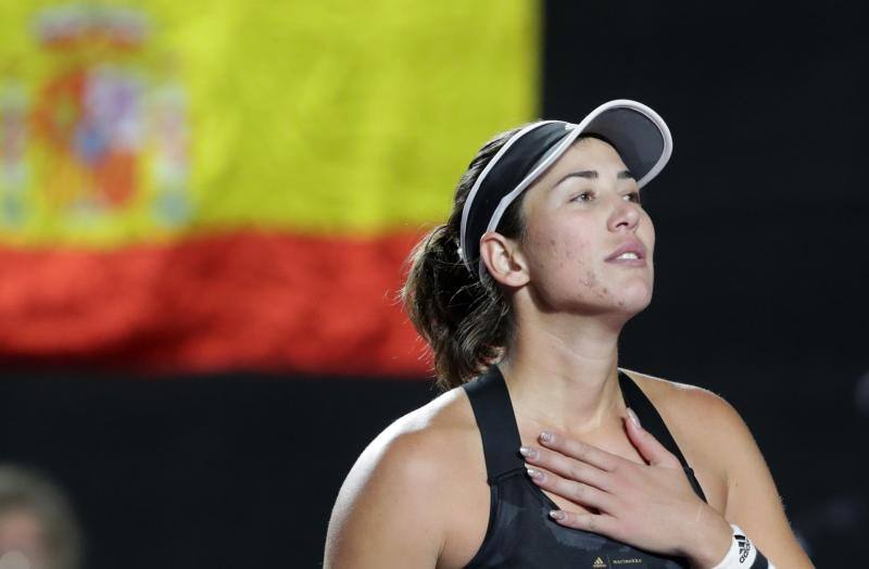 Garbiñe Muguruza celebra el triunfo de maestra. 