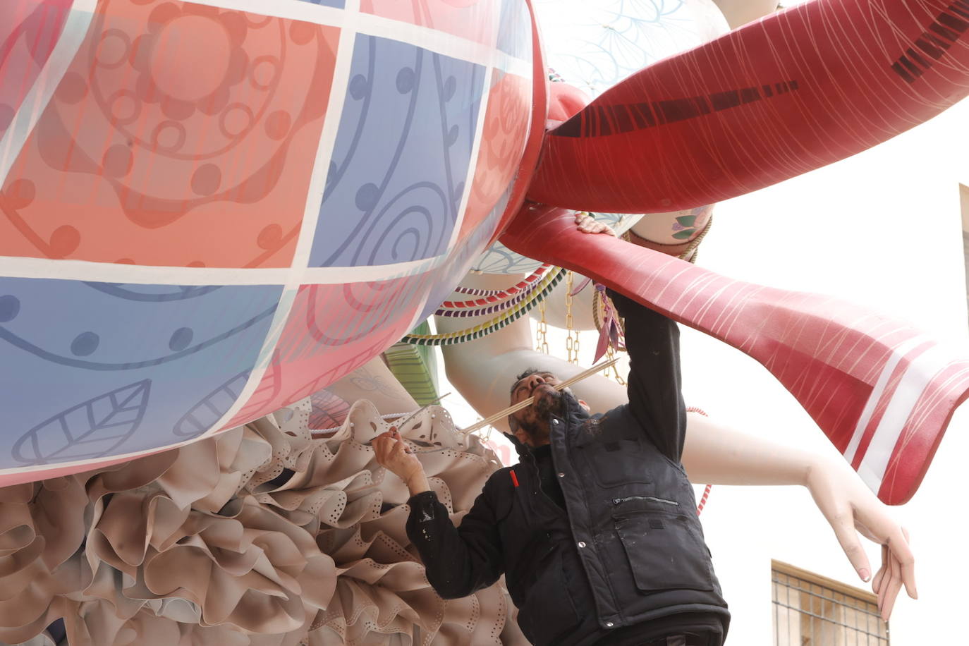 Fotos: Los plásticos que resguardan a las fallas de la lluvia