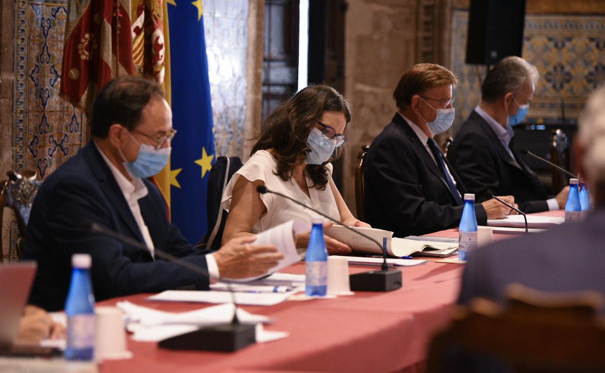 Vicent Soler, Mónica Oltra, Ximo Puig y Héctor Illueca, en un pleno del Consell. 