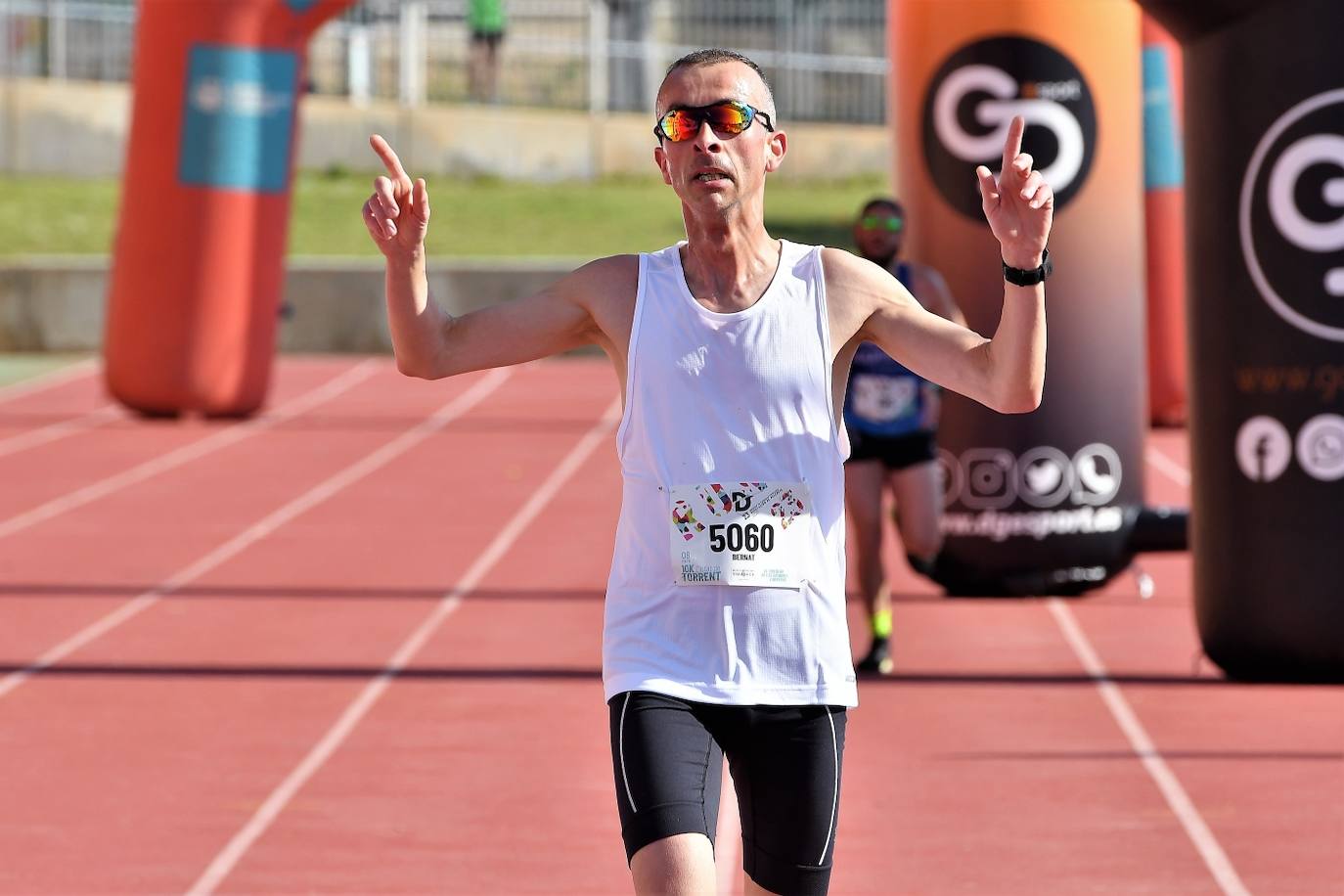 Fotos: Búscate en la 10k y la Media Maratón de Torrent