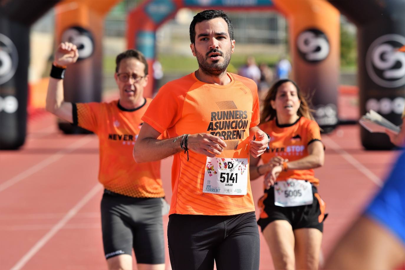 Fotos: Búscate en la 10k y la Media Maratón de Torrent