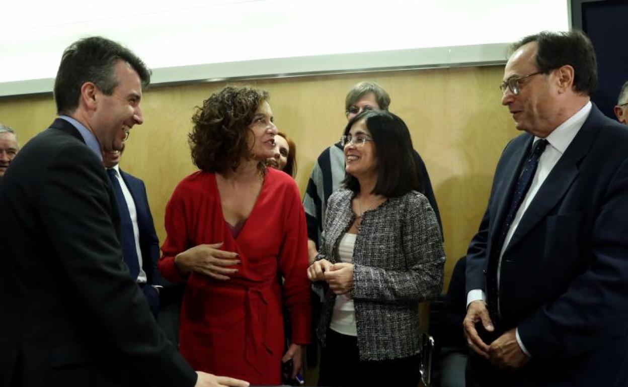 La ministra Montero y el ya exconseller Soler (a la derecha), en una de las reuniones del CPFF. 