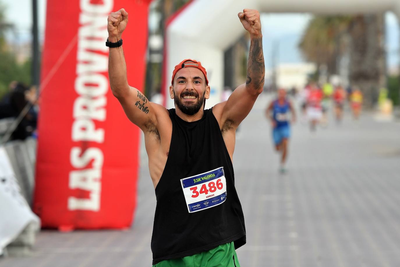 Fotos: Búscate en la llegada de la 15K y 7.5K Valencia Abierta al Mar 2022