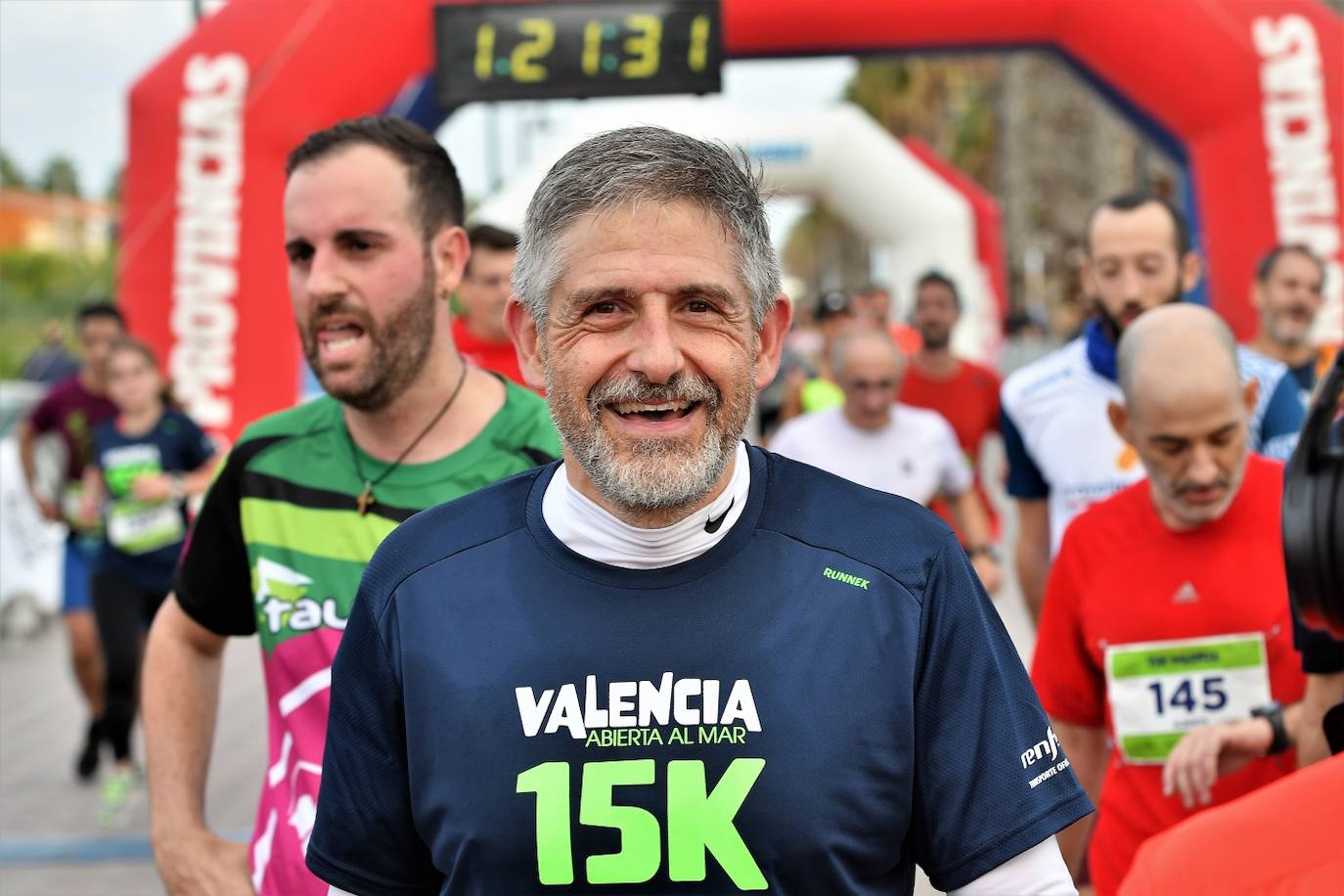 Fotos: Búscate en la llegada de la 15K y 7.5K Valencia Abierta al Mar 2022