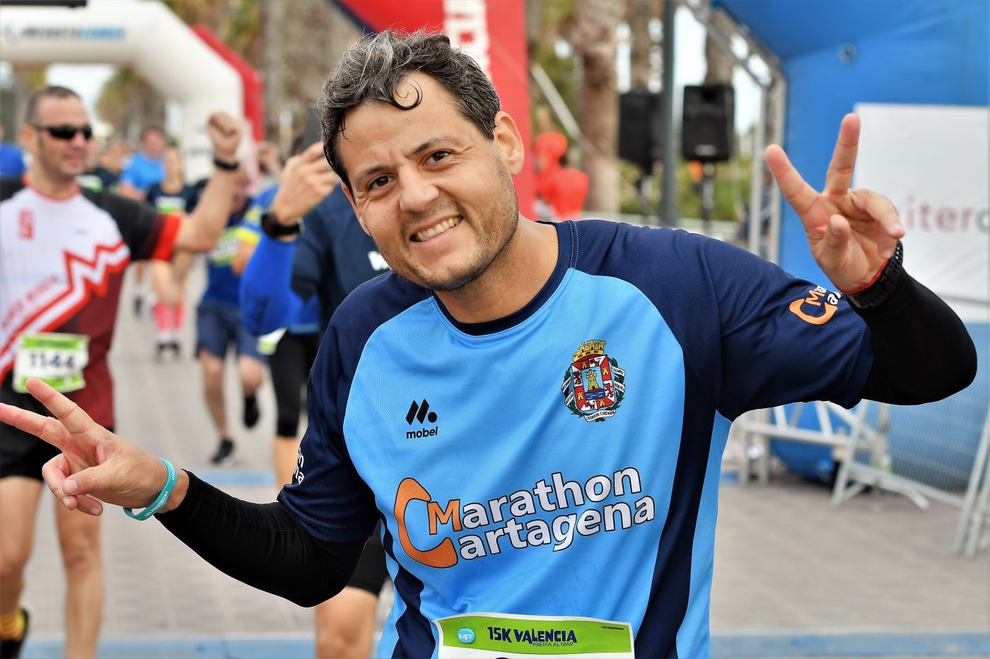 Fotos: Búscate en la llegada de la 15K y 7.5K Valencia Abierta al Mar 2022