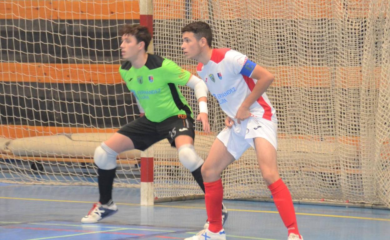 El portero del Paidos, José Iglesias, y Adrián Villar en el choque ante el CD Murcia. 