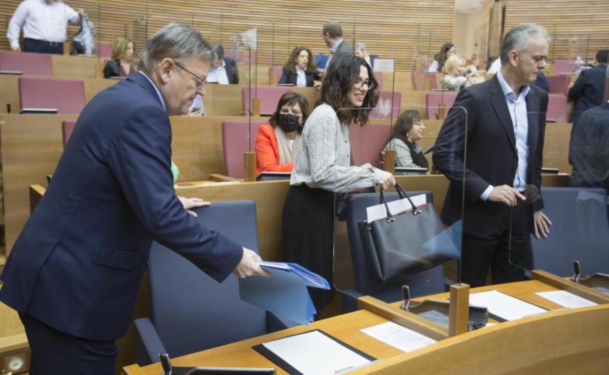 El presidente Puig junto a la vicepresidenta Mas y el vicepresidente segundo Illueca. 