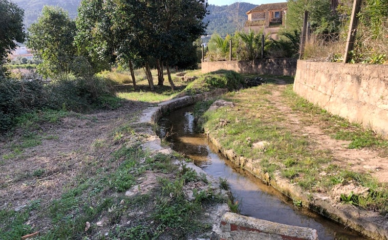 Imagen principal - Un tramo de acequia musulmana, el molino harinero medieval y el lavador de Almiserà.