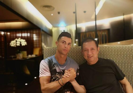 Cristiano y Peter Lim, en uno de sus encuentros en Singapur.