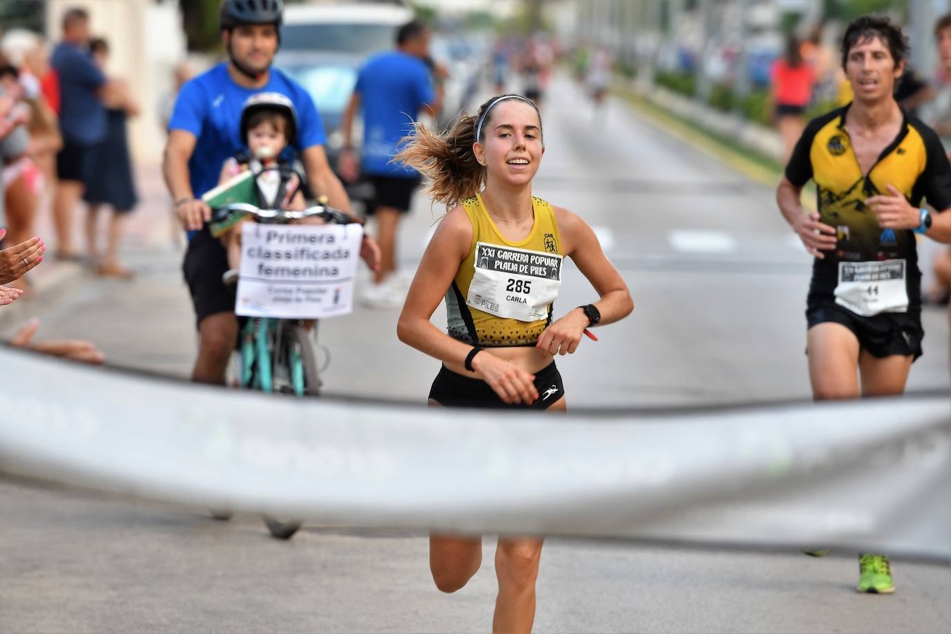 Búscate en la carrera popular Playa de Piles 2023