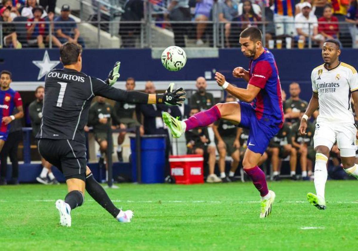 Ferran y Courtois, en un partido de pretemporada.