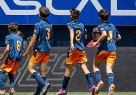 Los jugadores, celebrando uno de sus goles.