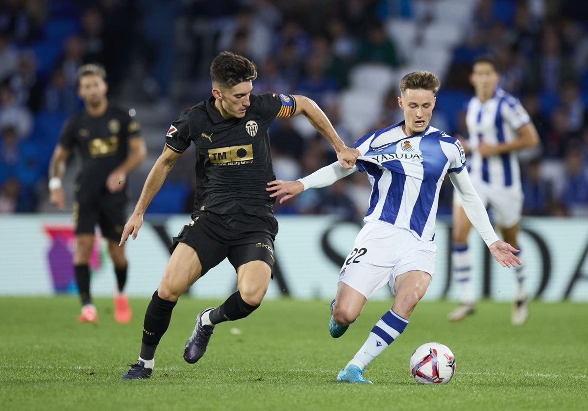 Pepelu y Turrientes, en el último partido del Valencia jugado ante la Real.